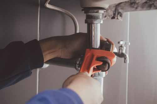 Pipe wrench installing plumbing